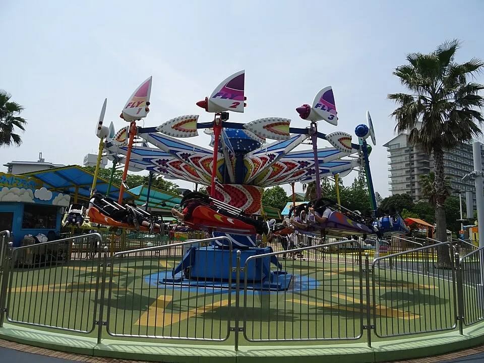 Kite Flyer spinning carnival ride with kite-shaped cars — fair ride rental Los Angeles