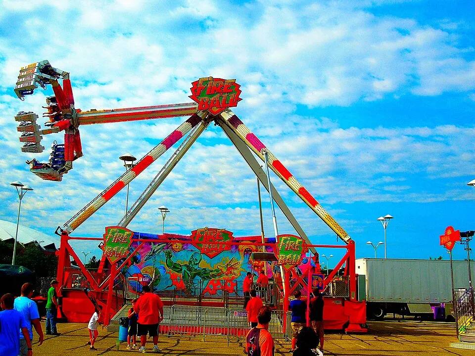 Rockstar swinging pendulum thrill ride at a fair — carnival ride rental Los Angeles